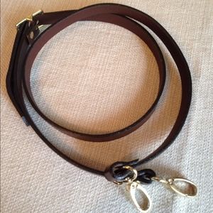 Adjustable leather strap with brass hardware