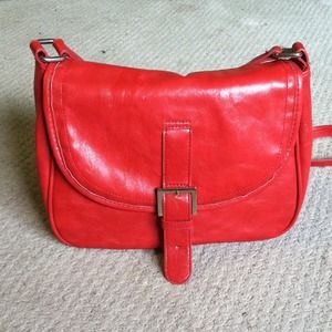 Solid Red MNG purse with across-body-strap.