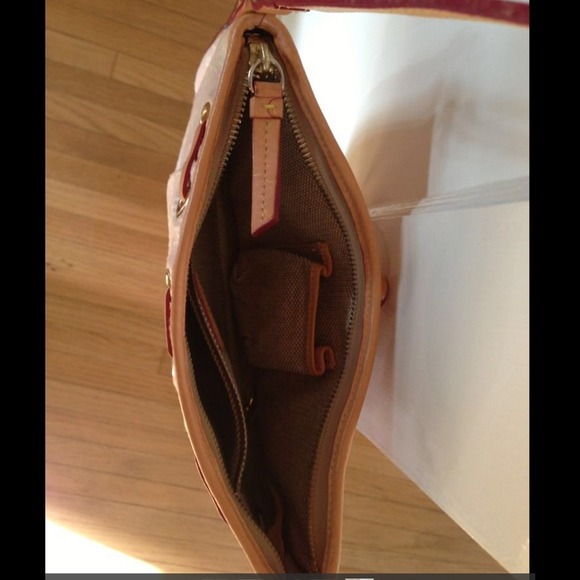 Lowered Pink Signature Dooney and Bourke - Picture 2 of 4