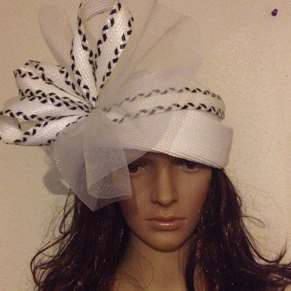 White & black hat worn 3 times