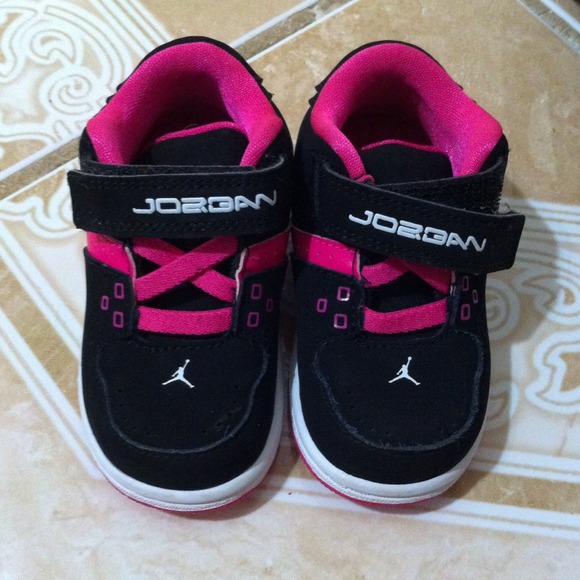 Black & hot pink Jordan's