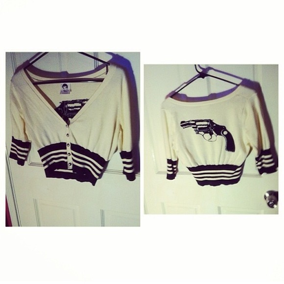 Selling this really cute gun cardigan
