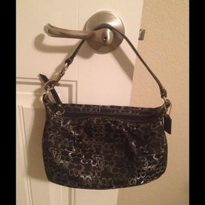 Small black and silver fabric Coach purse