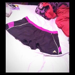Black, green, purple Adidas shorts