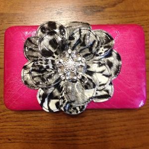 Pink wallet with white tiger print flower
