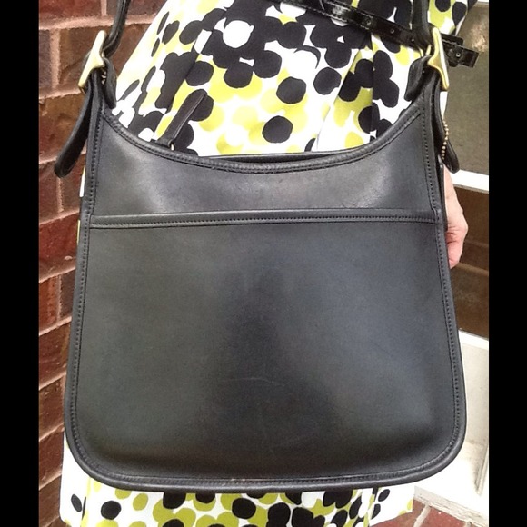 Black COACH leather shoulder or crossbody bag.