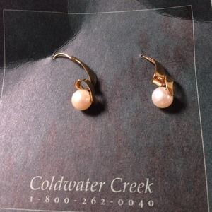Pearl swirl dangle gold earrings