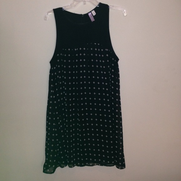 Black dress with white plus signs on them