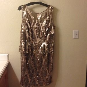 Very elegant sequin gold never been worn