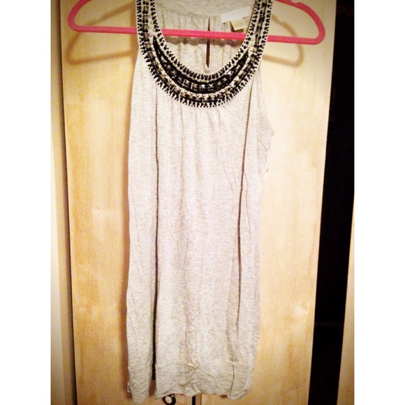 Cute long gray shirt with black beading.