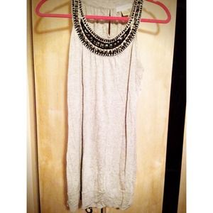 Cute long gray shirt with black beading.