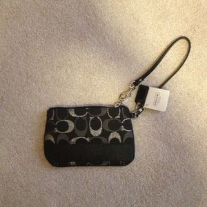 Black and silver coach hand clutch purse
