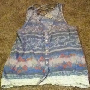 Floral design tank. Button up front. Cross back.