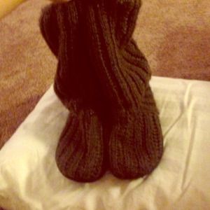 2 snags in the boots. Knit like material.