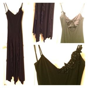 Formal dress with ruffled skirt & flower appliqué