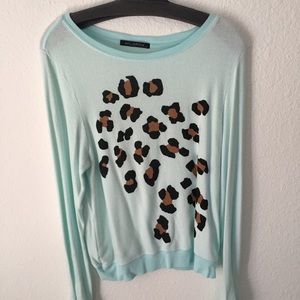 Wildfox couture leopard sweater in baby blue