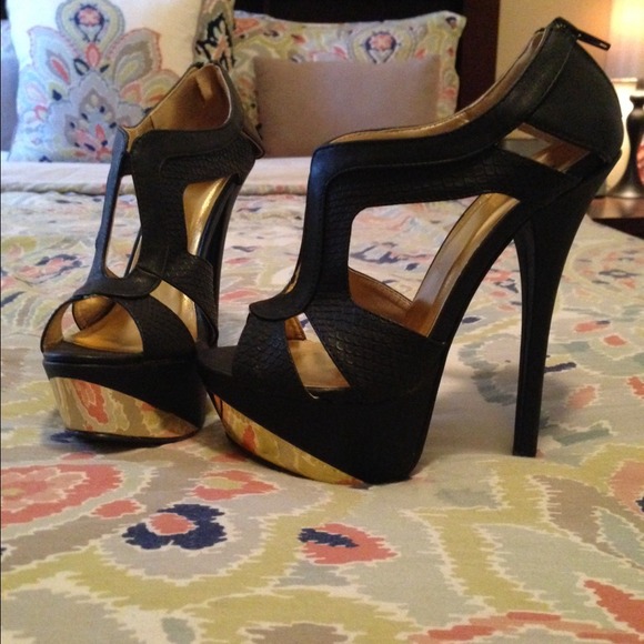 Black and gold high heels