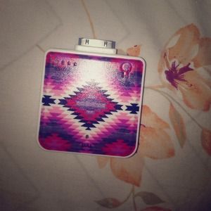 External iPhone // iPod battery charger.