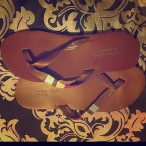 Brown American Eagle flip flops