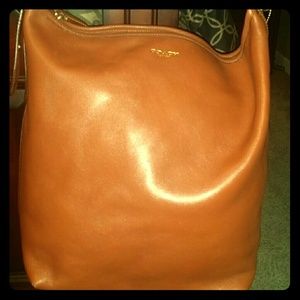 Brown leather coach -