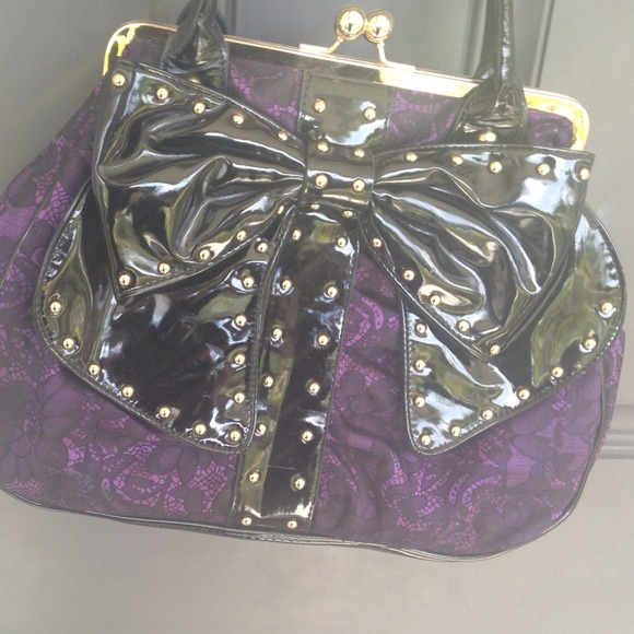 Charming Charlie's purple hand bag