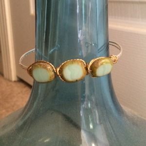 Wire wrapped turquoise, silver, and gold cuff