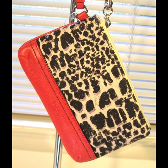 💯% authentic. Leopard coach wristlet - Picture 2 of 2