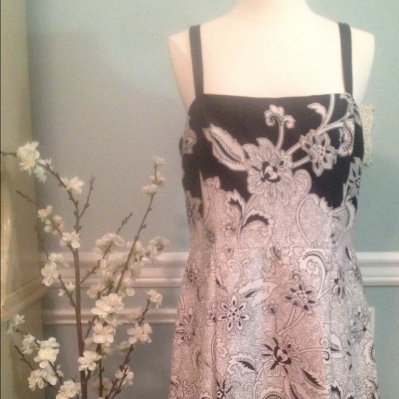 Cute black and white dress with thin straps.