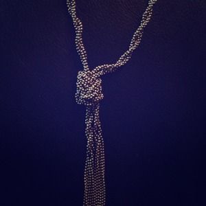 Stunning long chained silver knotted knot necklace