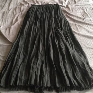 Long black pleated skirt