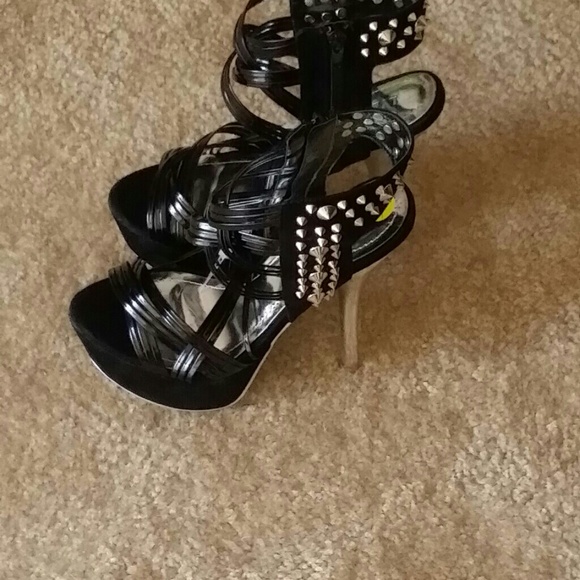 Silver and black heels