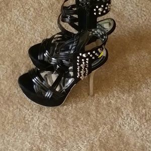 Silver and black heels