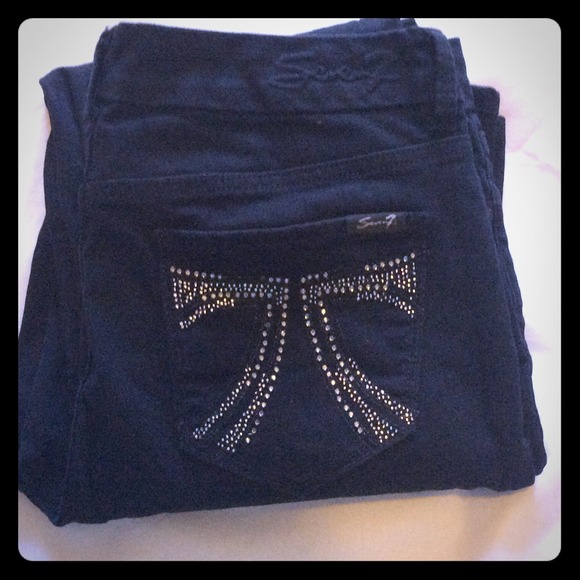 Black jeans with rhinestones.