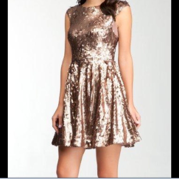 BRAND NEW gold bebe dress