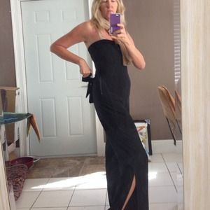 Strapless black jump suit with leg slits