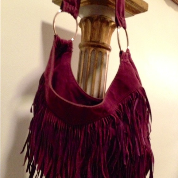 Purple fringed handbag. Awesome strap.
