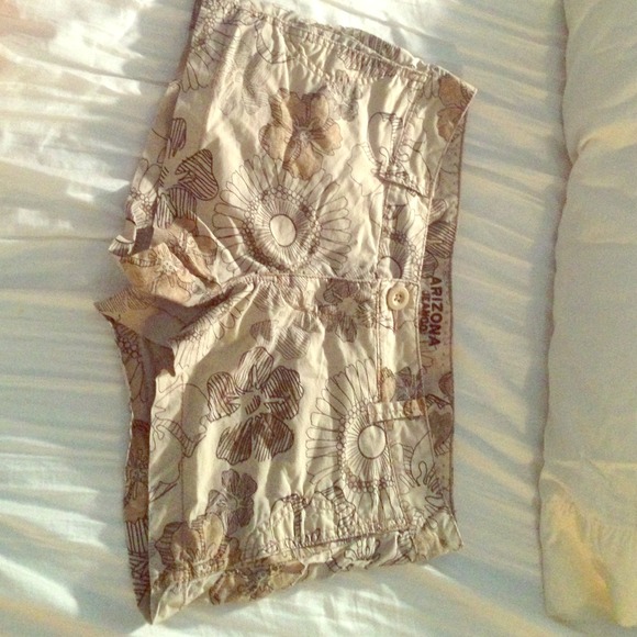 Tan shorts with flower detail