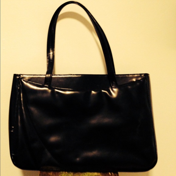 Black leather sleek handbag.