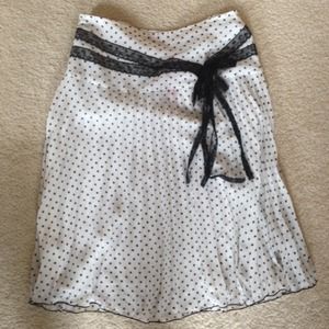 Polka dotted skirt with black lace bow