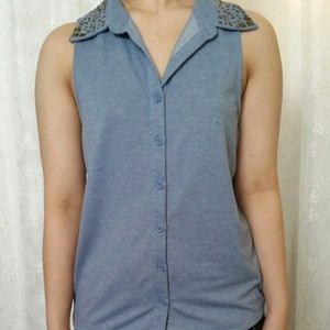 Tank with studded collar
