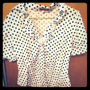 Ruffled white polka dot blouse