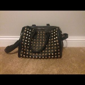 Gold stud black purse