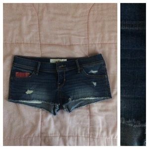 Medium wash, destroyed, denim cutoff shorts. *NWOT