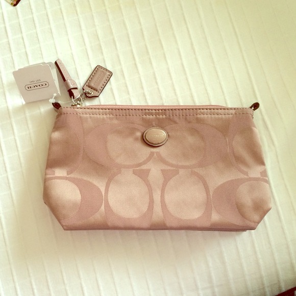 Authentic Coach cosmetic purse.