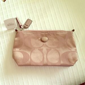 Authentic Coach cosmetic purse.
