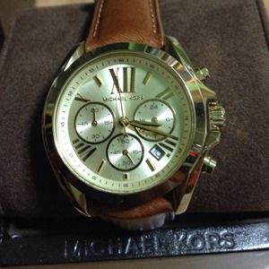 Michael Kors watch. Gold face with brown leather