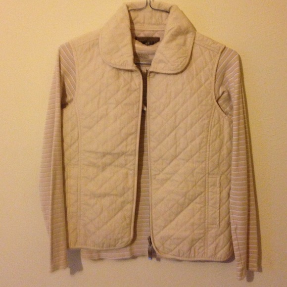 Long sleeved striped shirt with quilted vest.