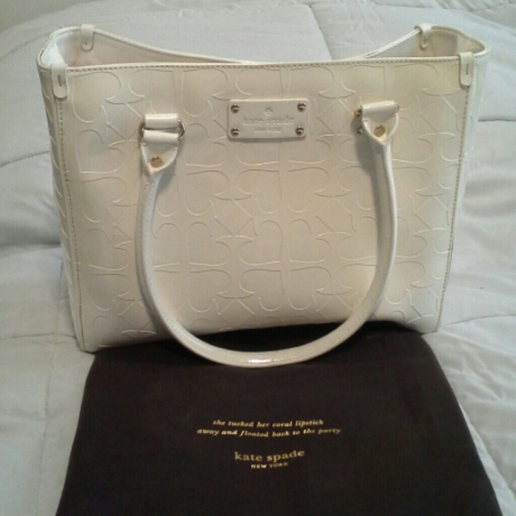 Kate Spade with dustbag. The IT summer bag!