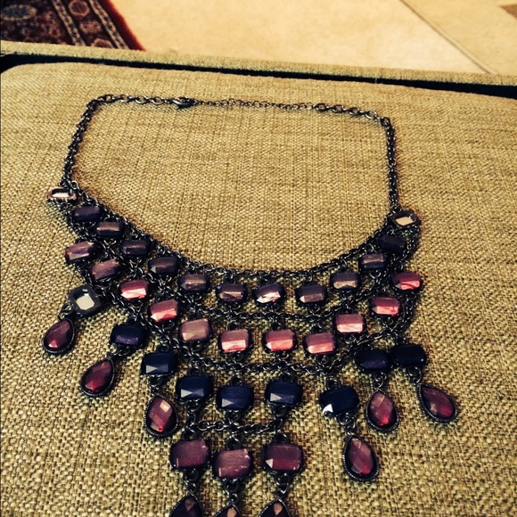A necklace with purple stones