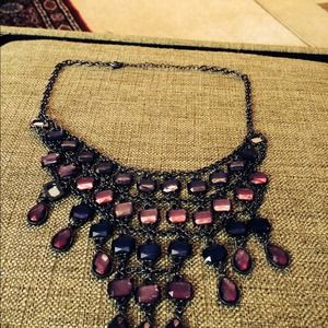 A necklace with purple stones